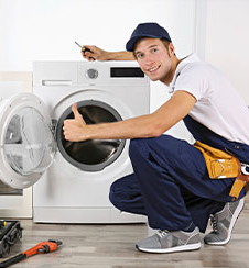 Verified Sarkar Services technician repairing an appliance in Bangalore
